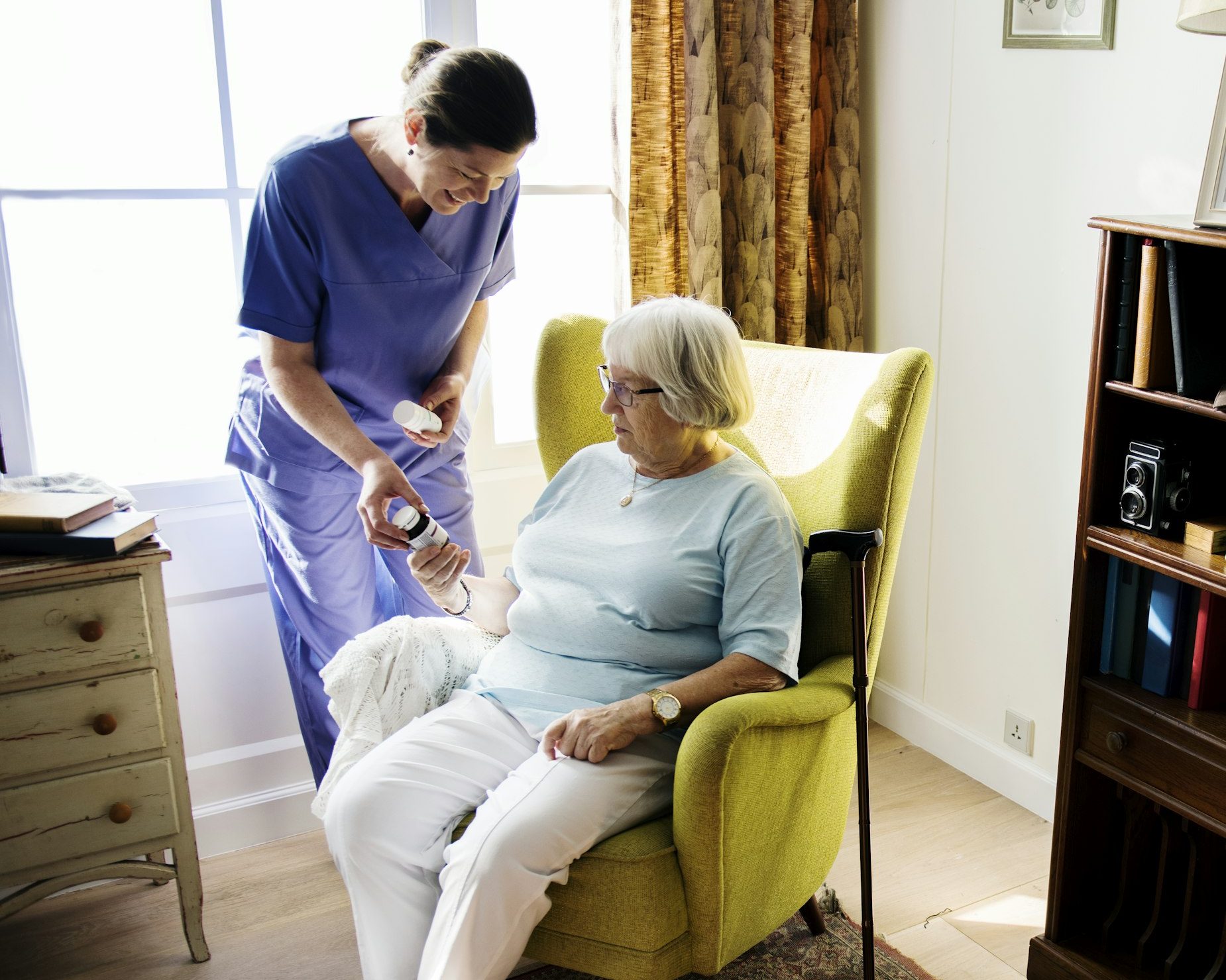 Nurse taking care of a senior woman